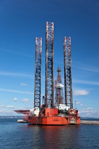 Red offshore oil rig